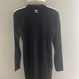 Adidas sport dress and accompanying clear backpack.